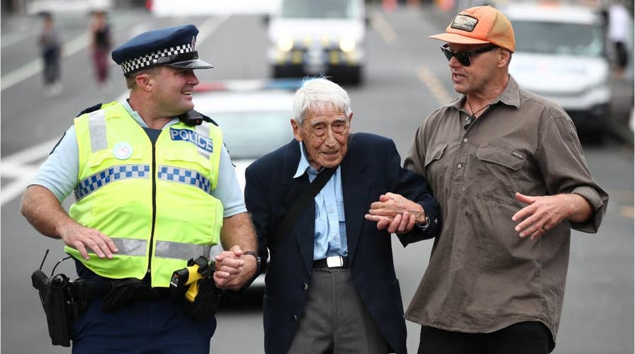 95-year-old WWII veteran takes four buses to march after New Zealand mosque shootings