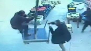 Raw video: Strong winds in Turkey blow away standing umbrella and the man underneath it