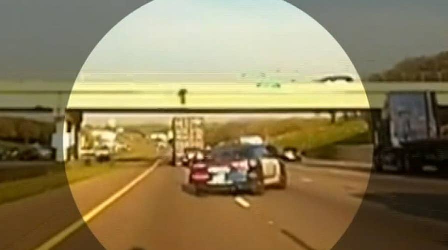 Truck driver parks under bridge to save teen who tried to jump onto highway