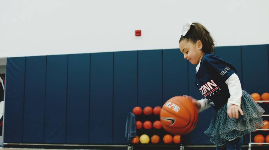 Girl battling rare genetic disorder turns to UConn Huskies for inspiration