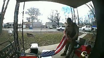 Missouri sheriff's deputy, veteran spotted on camera saving American flag touching the ground