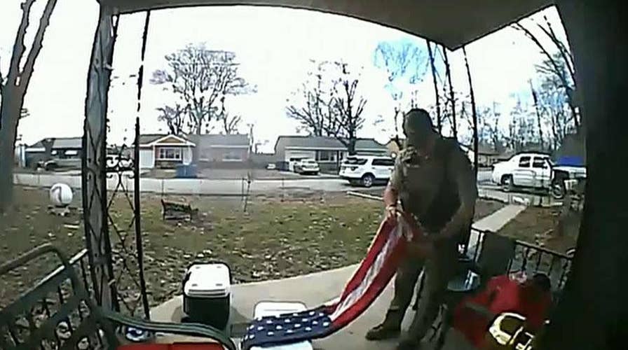 Missouri sheriff's deputy saves flag from touching ground, goes viral