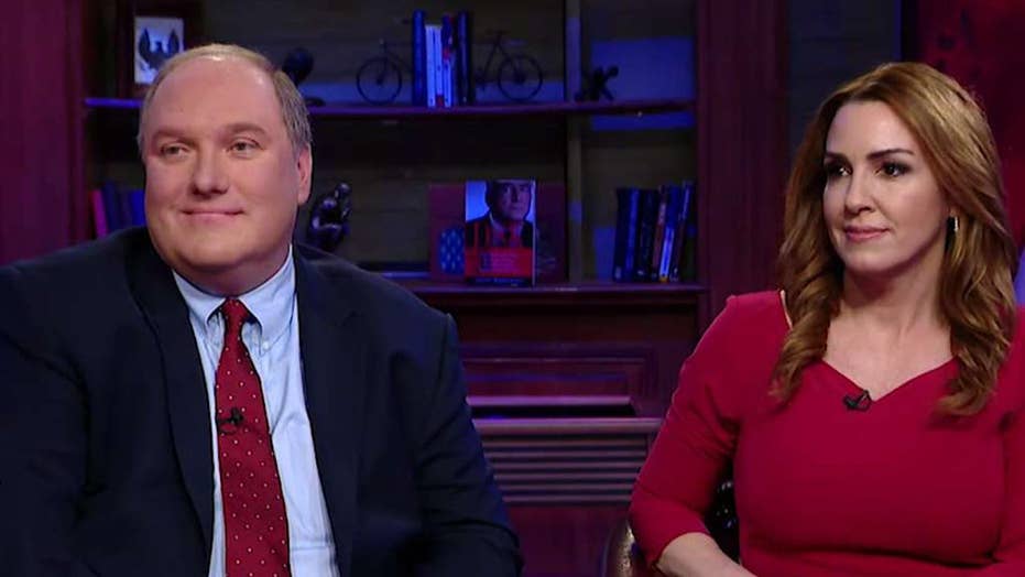 Journalists John Solomon and Sara Carter following the ...