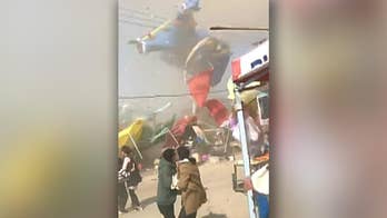 Two children killed after dust devil launches bounce house into air in China