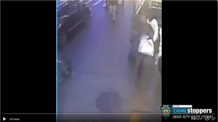 Man punches woman exiting a NYC subway station