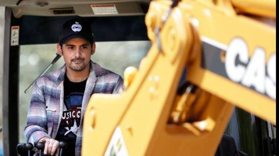 Country star Brad Paisley begins construction on space that will become a free grocery store to support needy families