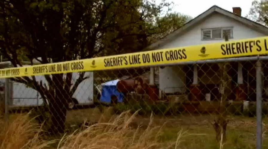 South Carolina men arrested after bodies of 2 women discovered buried at home, officials say