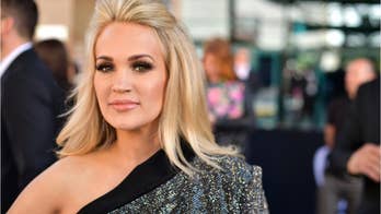 Carrie Underwood reveals in glam selfie that she was pumping before ACM Awards performance