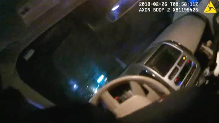 Officer dragged by car nearly a mile after suspect tries to flee traffic stop