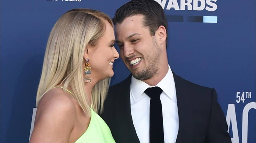 Miranda Lambert, husband Brendan McLoughlin display PDA on 2019 ACM Awards red carpet