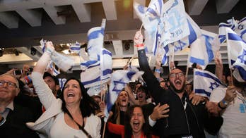 Exits polls in Israeli election show dead heat between Netanyahu and challenger