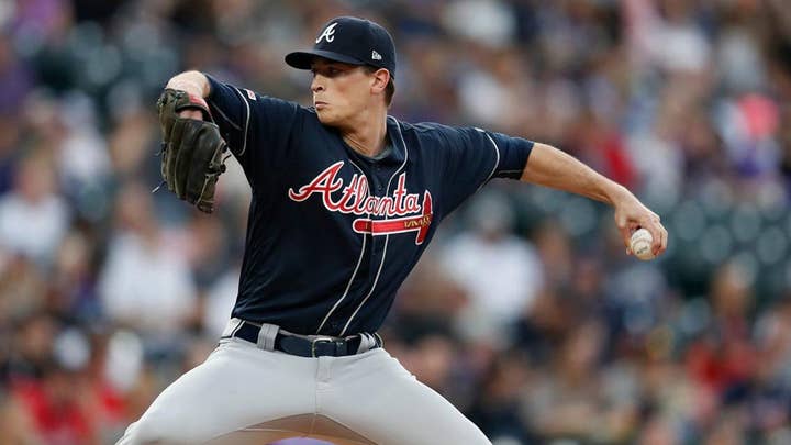 Atlanta Braves players get rescued from an elevator