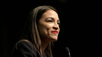 Ocasio-Cortez says she was ‘astonished’ when man left sign outside her office in support of both her and Trump