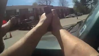 Kentucky police officers seen shooting suspect who was running at them with gun