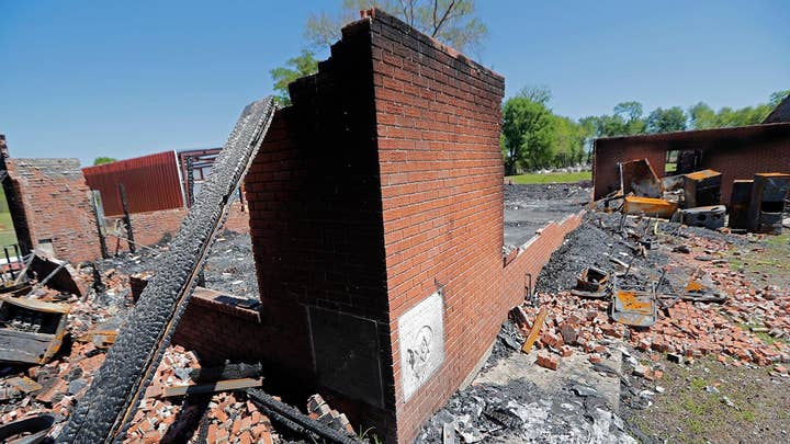 Son of sheriff's deputy reportedly arrested in connection with fires at historically black churches