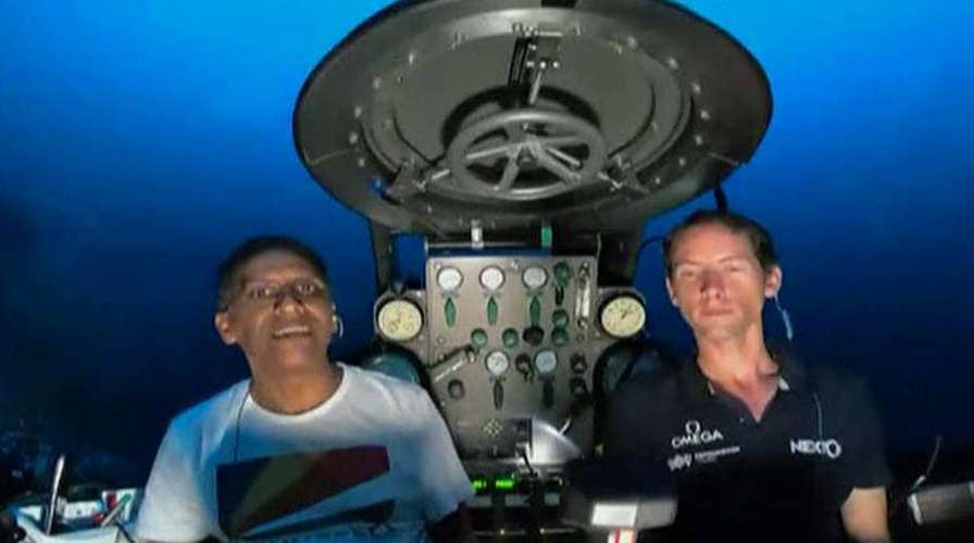 World leader makes climate change plea from underwater