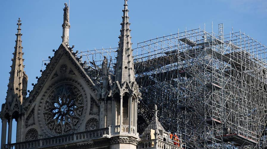 How will Notre Dame rebuild following catastrophic fire?