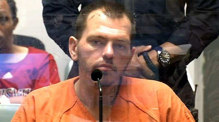 Half-naked man shot after allegedly breaking into neighbor's home