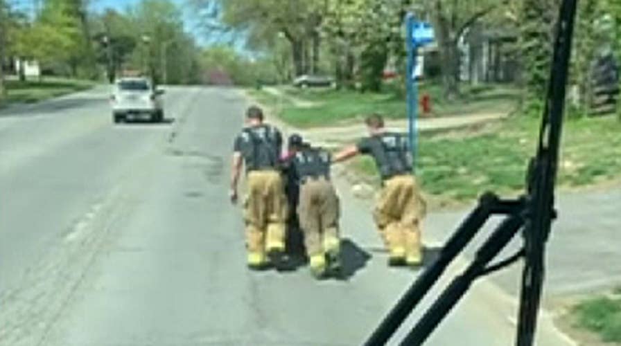 Firefighters push veteran home after his motorized wheelchair dies