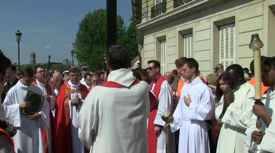 Way of the Cross ritual takes place around Notre Dame Cathedral