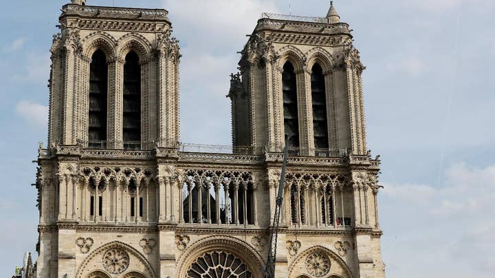 Spire, woodwork fall victim to Notre Dame fire but artifacts are saved