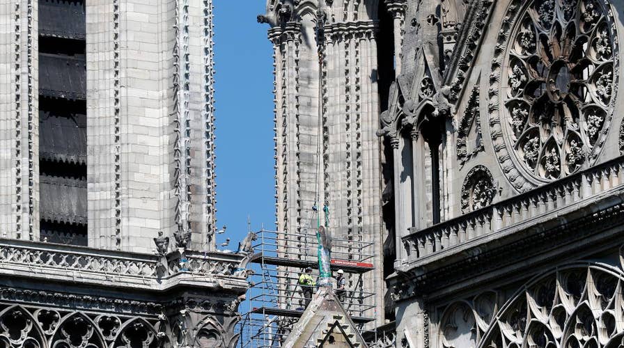 Nightfall brings sadness and quiet to Paris after Notre Dame fire