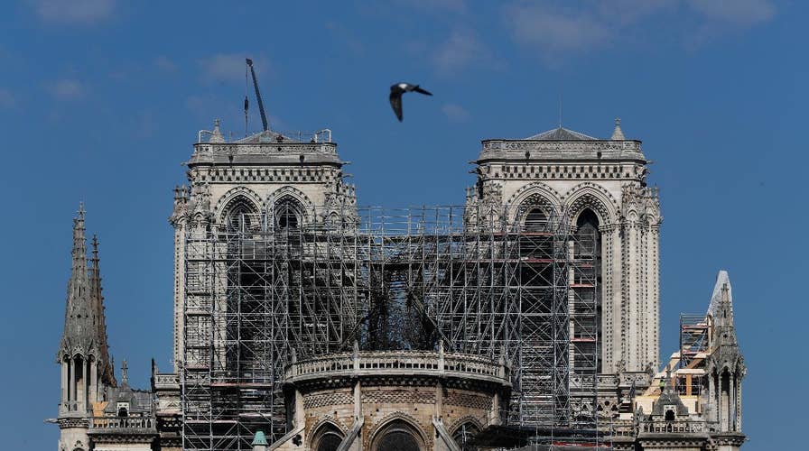 Flames burned iconic Notre Dame church for hours