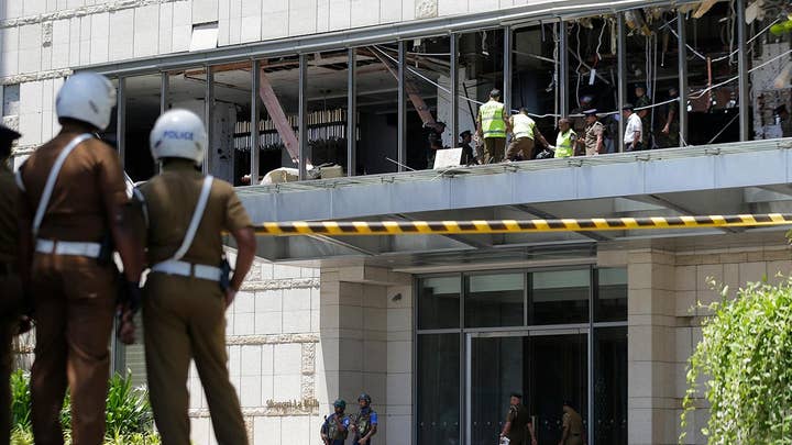 Sri Lanka points to Islamic militants in a series of attacks on churches and hotels