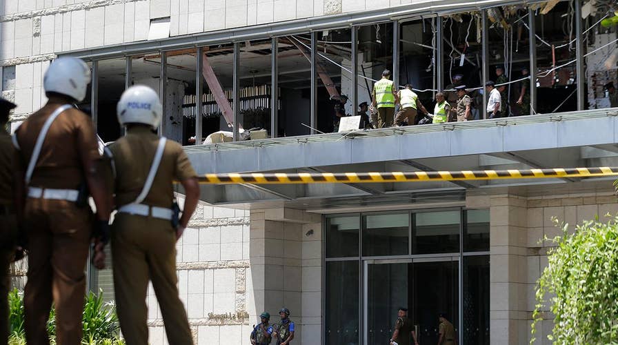 Sri Lanka points to Islamic militants in a series of attacks on churches and hotels