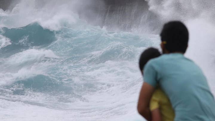 Hawaii’s islands are under threat from rising sea levels, experts warn