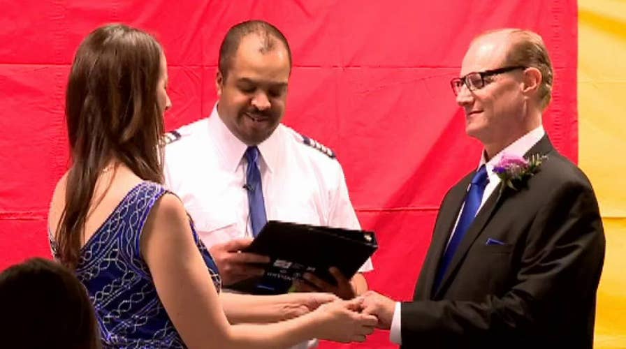 Couple who met at the baggage claim at Cleveland Hopkins airport return to hold their wedding ceremony