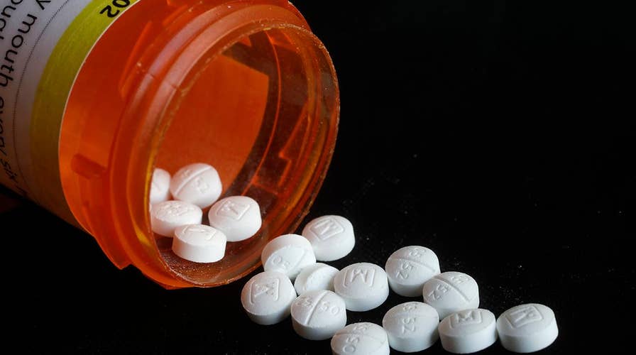 Pharmaceutical executive faces criminal charges in America's opioid crisis