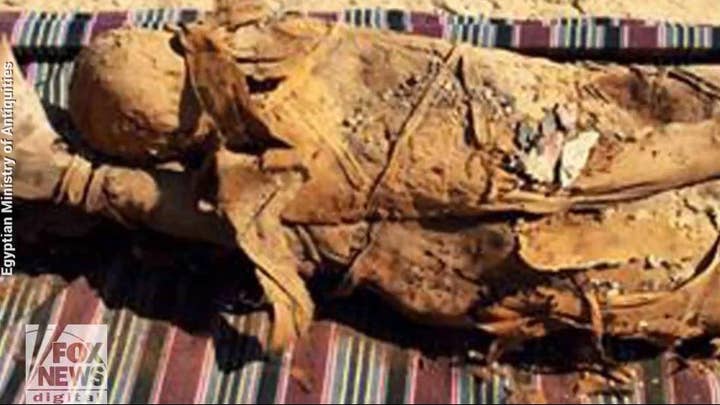 Archaeologists in Aswan, Egypt discover a tomb containing 30 mummies