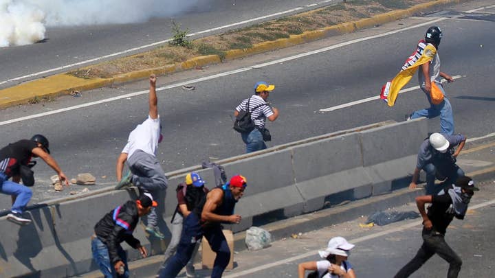 Supporters of the Venezuelan opposition take to the streets in Caracas