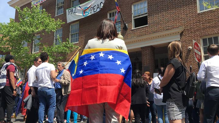 Tense scene breaks out as Venezuelans clash with pro-Maduro Code Pink activists