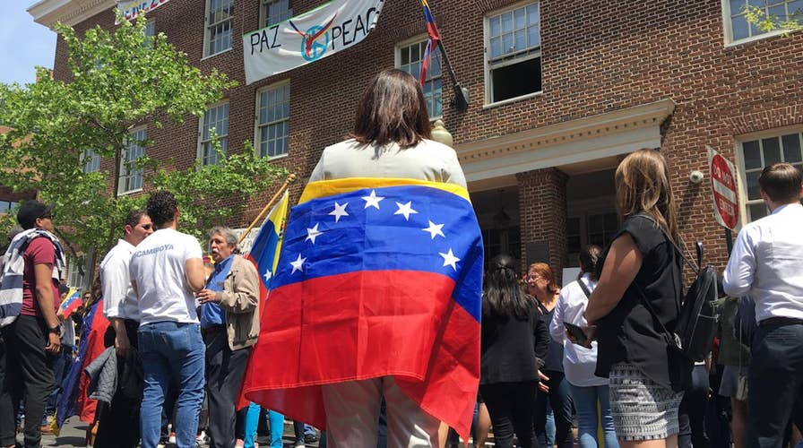 Tense scene breaks out as Venezuelans clash with pro-Maduro Code Pink activists