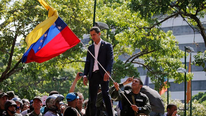 Clashes continue in Venezuela as US backs Guaido's calls for liberation