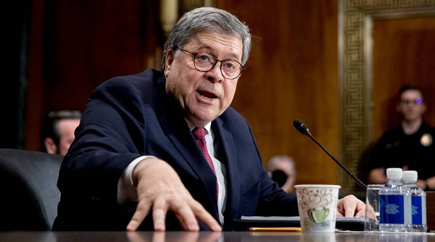 Lawmakers split down party lines over Attorney General Barr's defense of his handling of the Mueller report