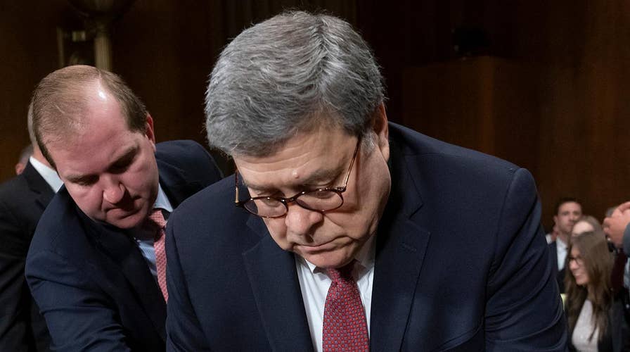 Attorney General Barr battles Democrats over Mueller report