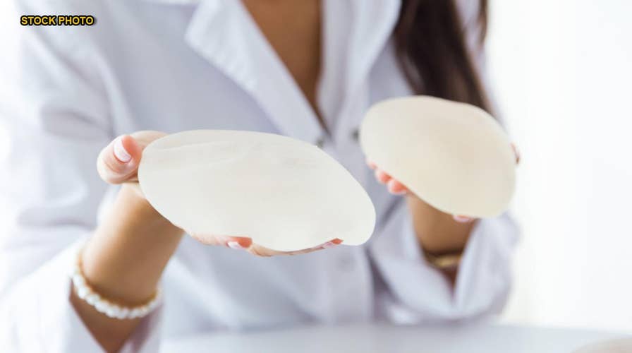 Breast implants tied to rare cancer to remain on US market