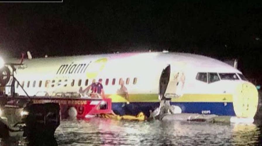 Boeing 737 slides off runway and into river in Jacksonville, Florida