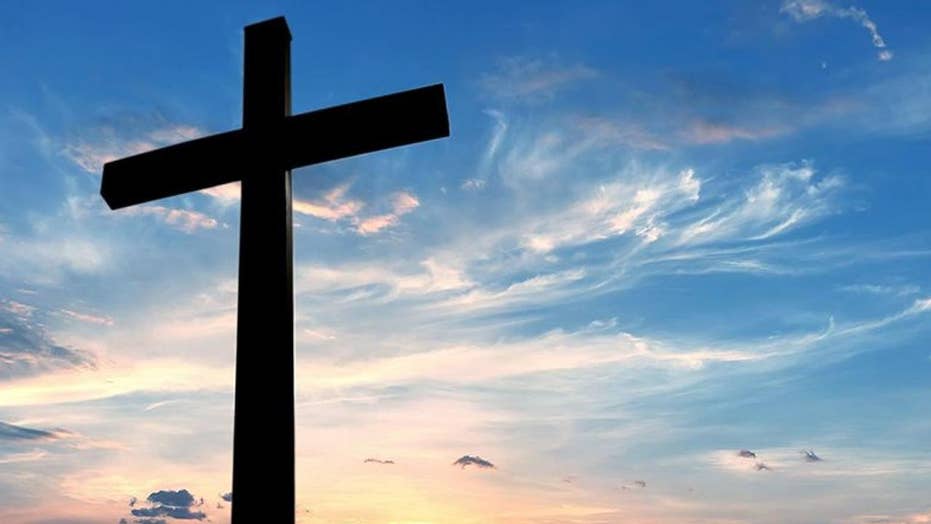 the shadow of a cross representing christianity