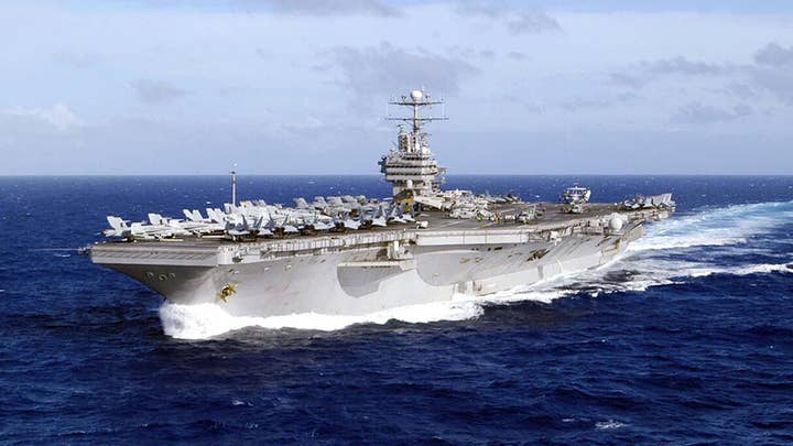 U.S. deploys strike group to send 'clear and unmistakable' message to Iran
