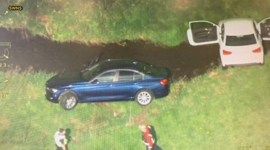 Police chase ends with cars crashing into stream