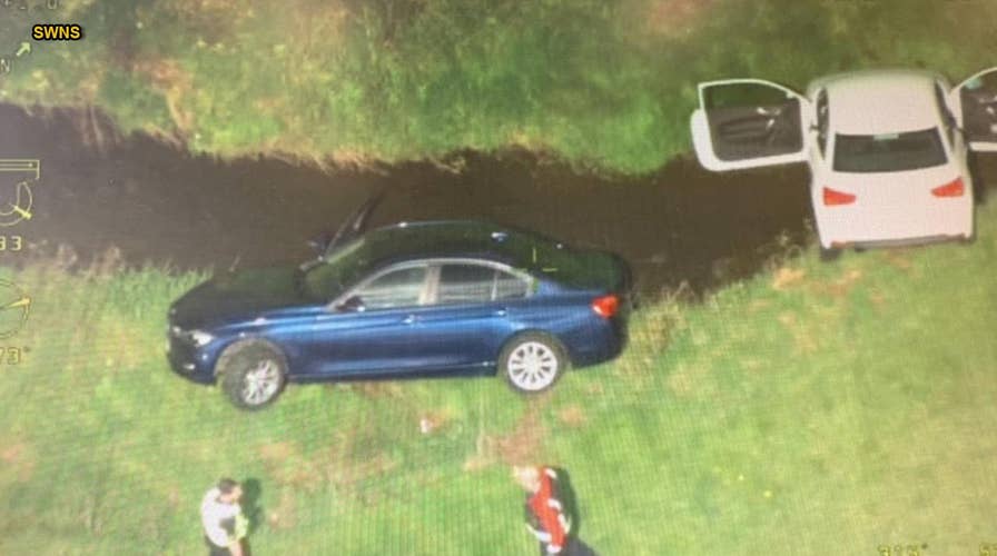 Police chase ends with cars crashing into stream