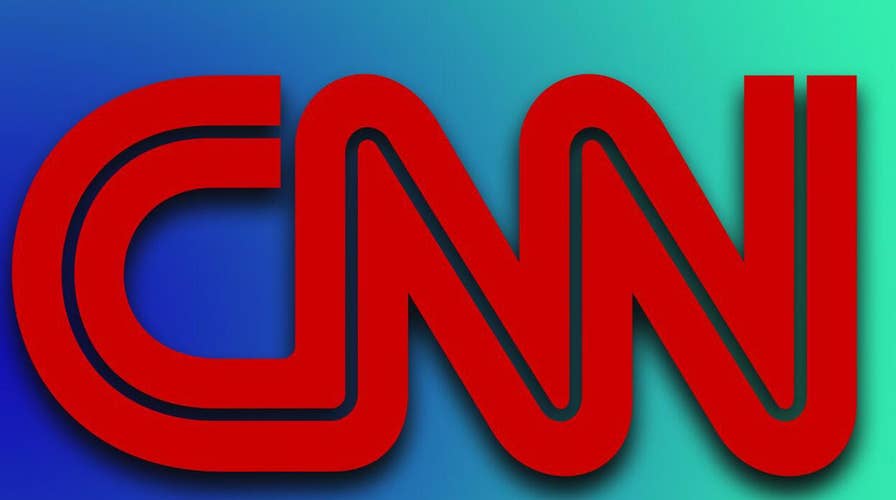 Struggling CNN cuts staff even as it moves to fancy new digs