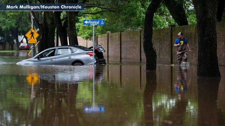 Texas communities under water after a foot of rain hammers state