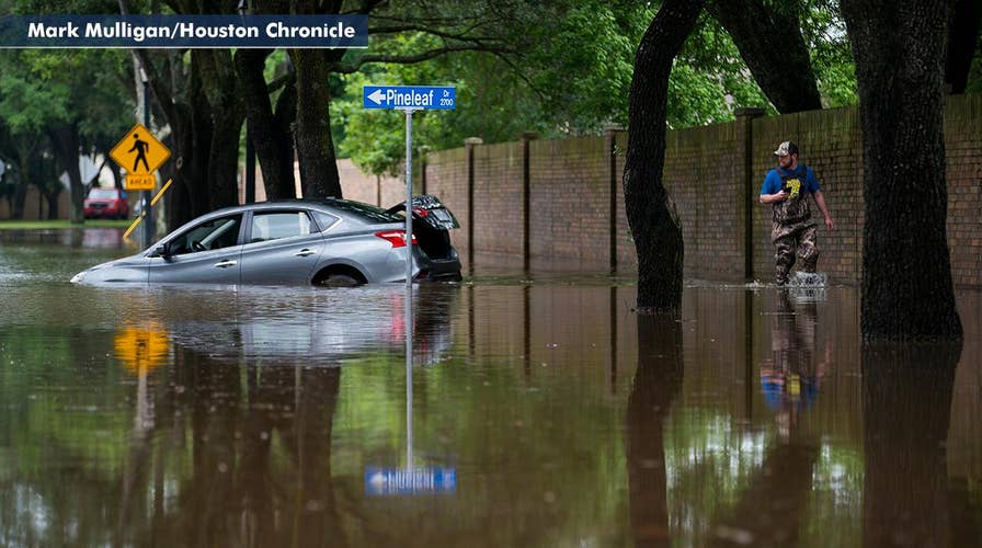 Texas communities under water after a foot of rain hammers state