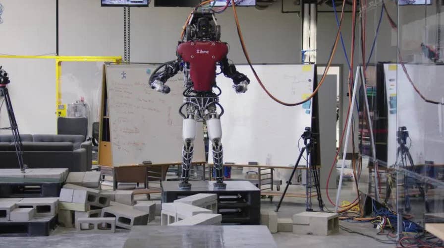 Researchers unveil video of robot taking human-like steps