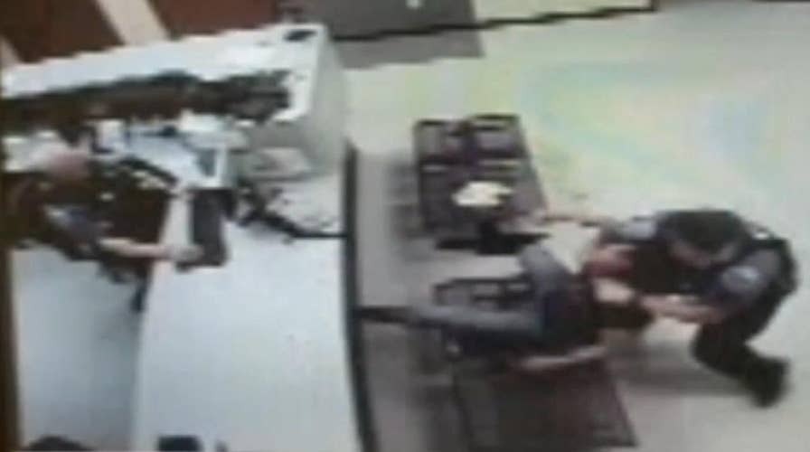 Police officer fired, charged after choking incident caught on camera